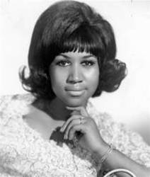 Escucha la canción de Aretha Franklin Joy to the world gratis de lista de reproducción de Canciones navideñas en línea.