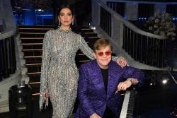 Escuchar las mejores canciones de Elton John & Dua Lipa gratis en línea.
